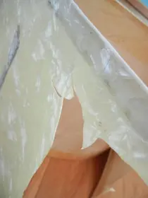 What causes cracking of Premier wrap?