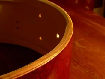 Sling snare bearing edge recesses?