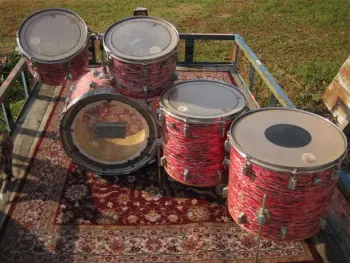 Pearl wood / fiberglass in red oyster