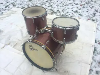 are Vintage Gretsch Round Badge 3 pc drum set in original burgundy sparkle wrap finis