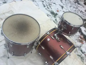 are Vintage Gretsch Round Badge 3 pc drum set in original burgundy sparkle wrap finis