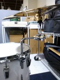 rim mount to hold a cow bell/wood block