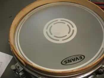 Here is a great inexpensive shelf for snare display $39.00